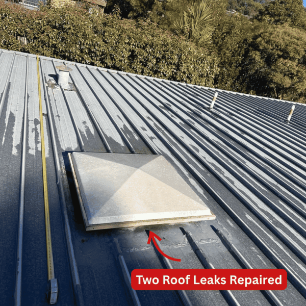 Image Annotated: Flat metal roof where two leaking areas were repaired at a large Canberra home. Wide view of the flat metal roof at a large single-storey home in Canberra.